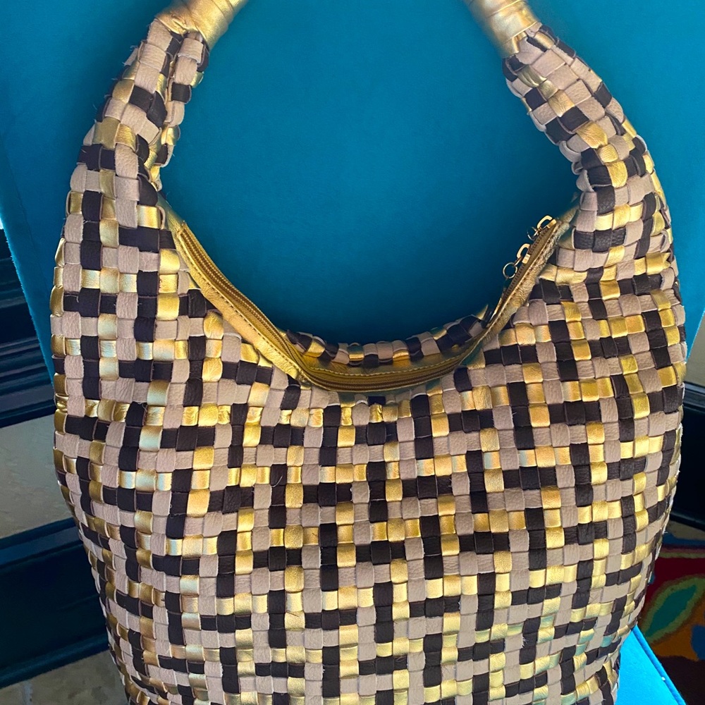 Gorgeous designer bag from Italy. Very classy!